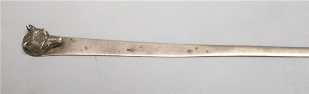 A George V silver letter opener, with fox head terminal, by Asprey & Co, Chester, 1928 & 3 other items.
